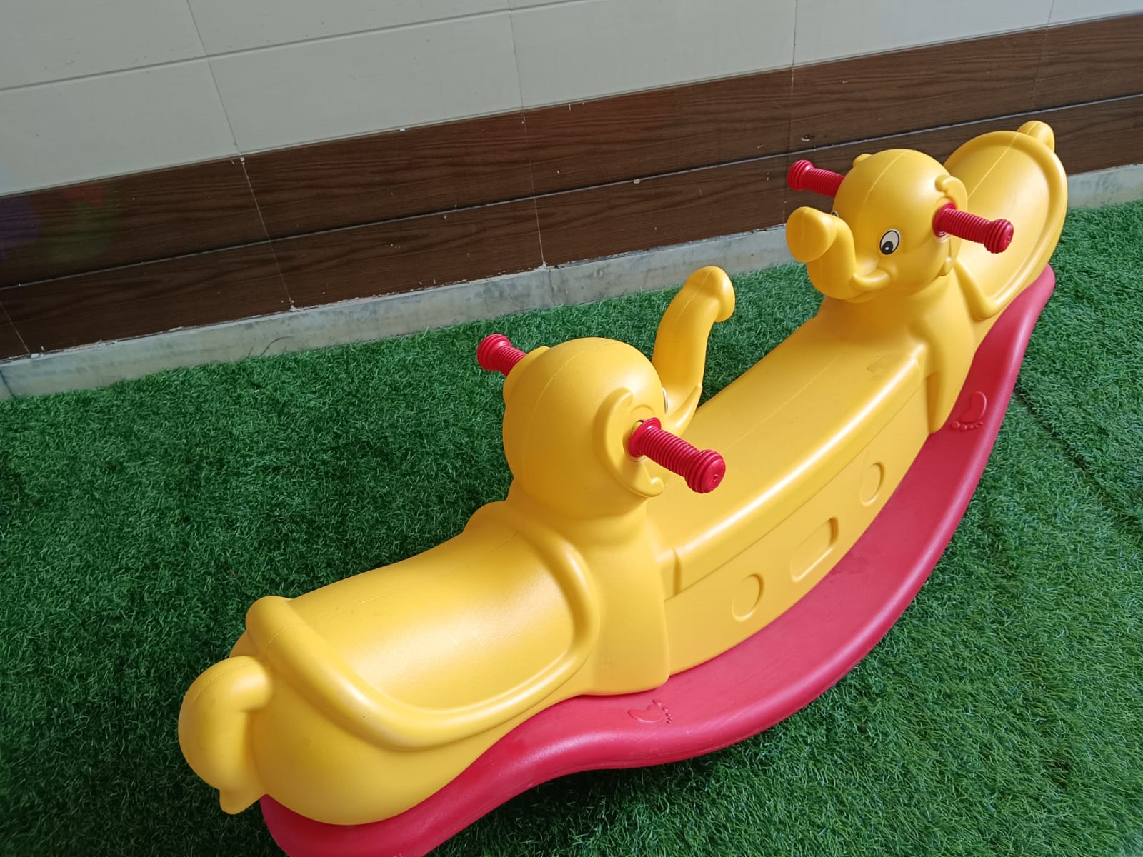 Double rocker play equipment